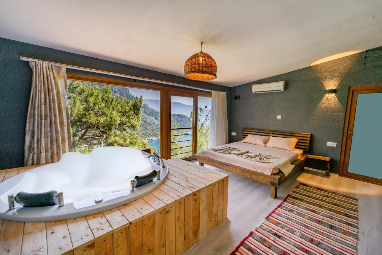 Kamer met Queensize Bed en Uitzicht op Zee